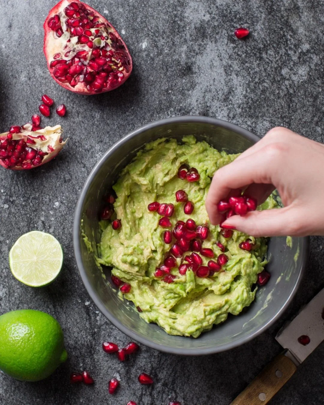 Festive Grinch Guacamole with Pomegranate